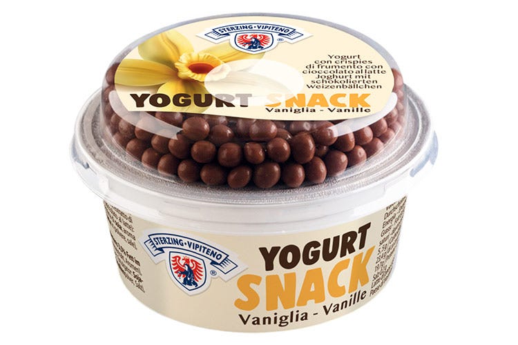 Yogurt intero alla vaniglia con crispies di frumento con cioccolato al latte - Yogurt Snack di Latteria Vipiteno Due novità fresche e genuine