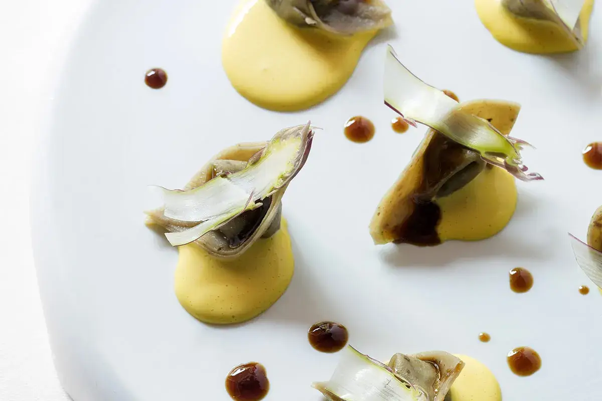 Ravioli di asparagi selvatici, zabaione di Parmigiano Reggiano&nbsp; Ravioli di asparagi selvatici, zabaione di Parmigiano Reggiano