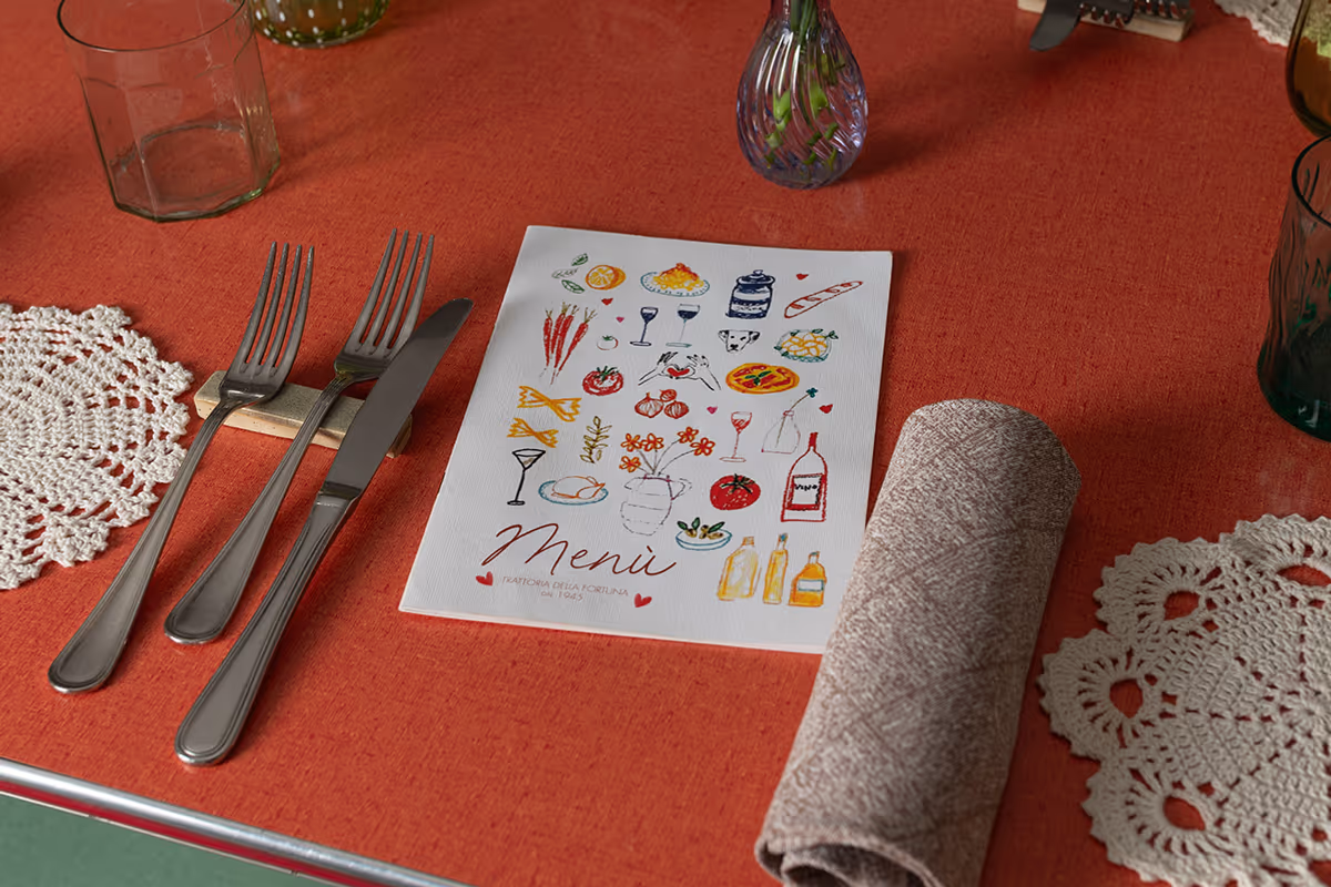 La mise en place e il menu della Trattoria della Fortuna