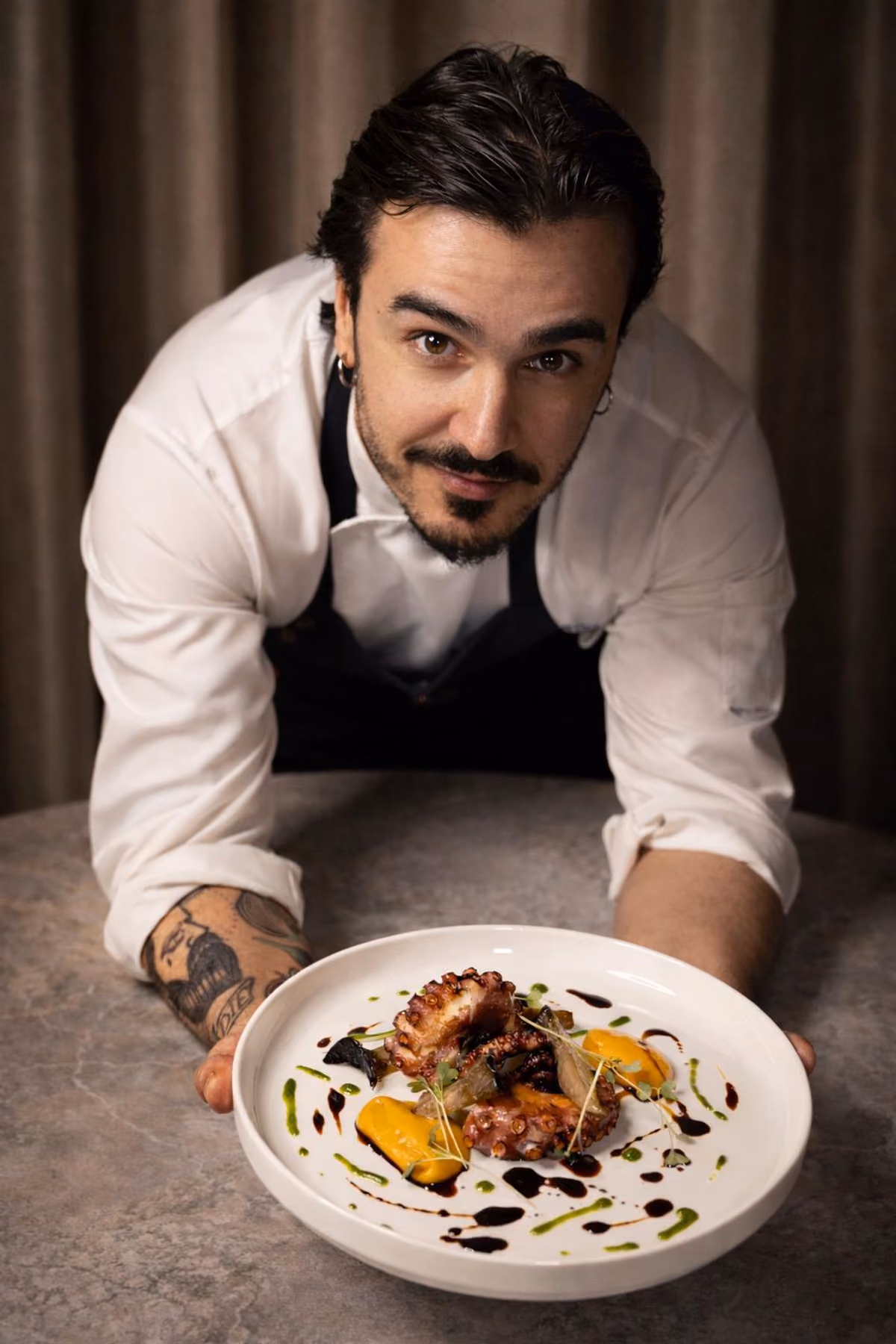 A CRU Vineria & Cucina è esaltata la Cucina della Capitanata, con molti piatti di mare come questo polpo