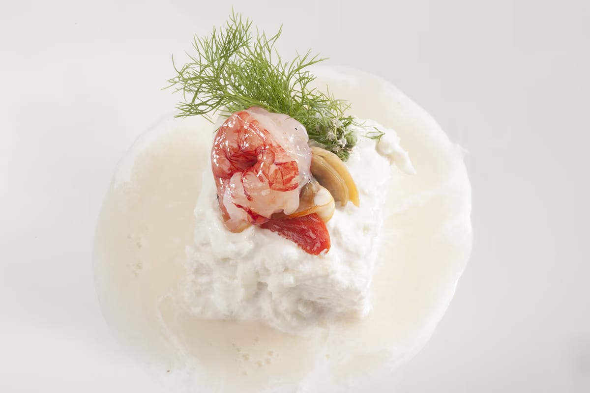 La ricetta della vellutata con cozze, vongole, gamberi e pane cafone