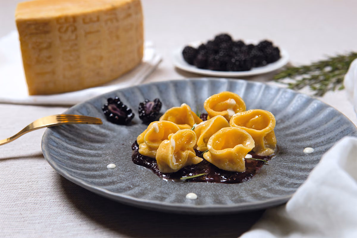 La ricetta senza glutine dei Tortelli al Monte Veronese e salsa di more