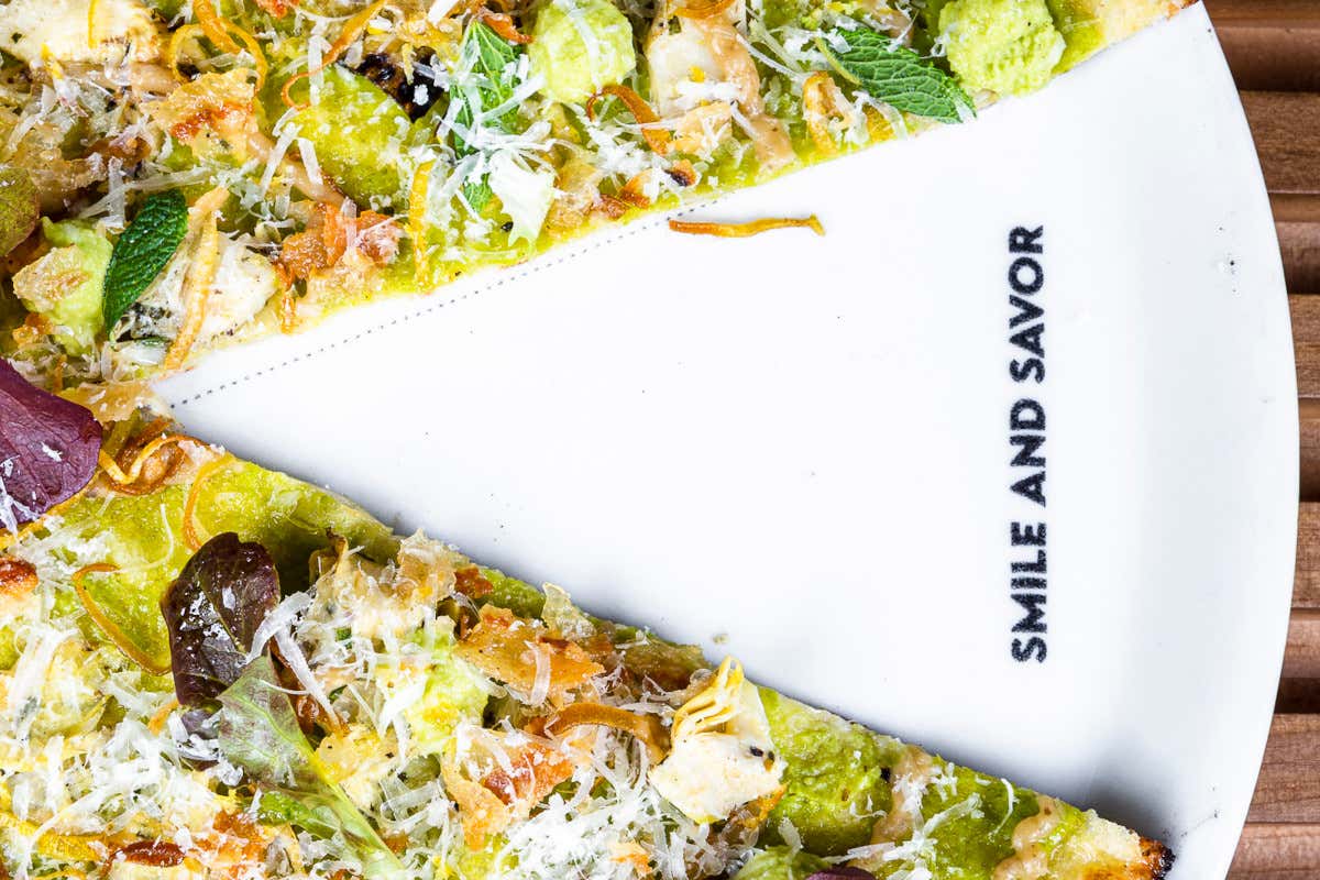 Non la solita pizzeria di quartiere: lo stile e il gusto pop di Slice of Capanno