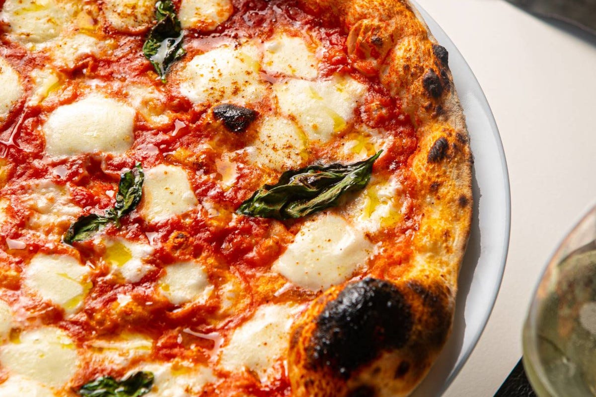 Divinity, sui tetti di Roma tra “spezial pizza” e “Iconic easy lunch”