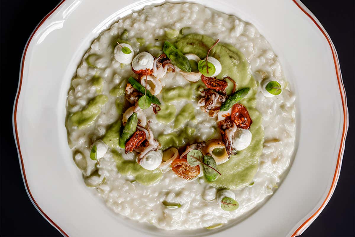 Risotto con calamaro asparagi caprino al limone e pomodoro