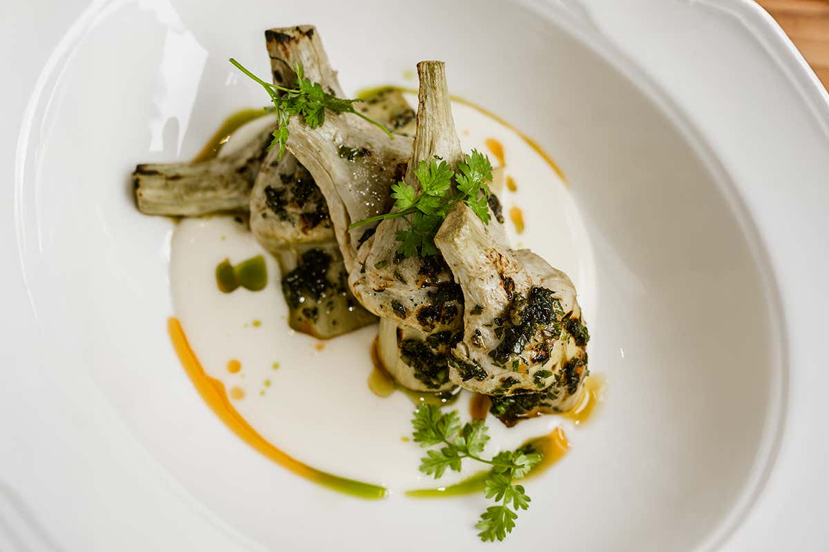 Carciofo alla brace fonduta di grana menta e limone