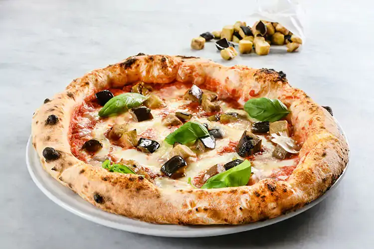 La linea MInute di Bonduelle Foodservice &egrave; apprezzata dal mondoi del delivery - Foto Ispirazioni Culinarie Pizza e verdure surgelate Il valore aggiunto di Bonduelle