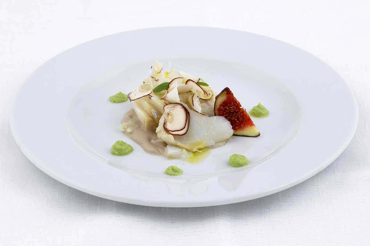 Clipfish in olio di cottura su crema di funghi porcini Clipfish in olio di cottura su crema di funghi porcini