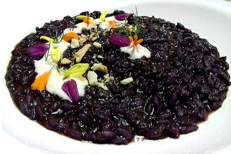 Il Carnaroli al nero di carote deep purple con fonduta di Vastedda del Belice di Ciccio Giuliano (Nero per caso)