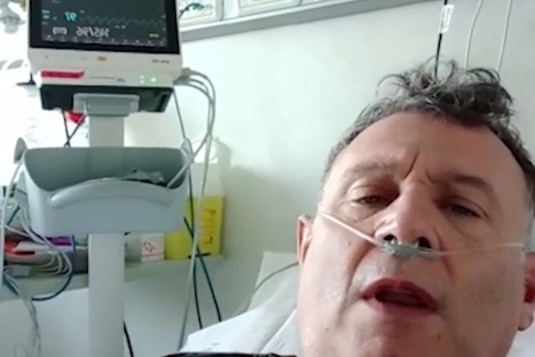 Pietro Candela nel suo letto d'ospedale  Ristoratore no vax in terapia intensiva: