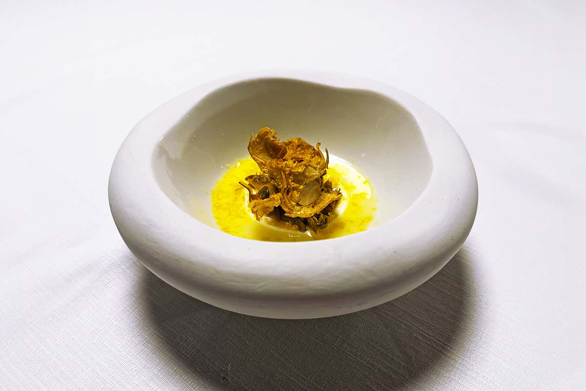 Pannacotta, agrumi, carciofi e bottarga