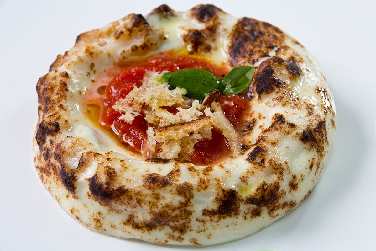 Pizza Una terra, una famiglia e una chef stella Michelin: la ricetta vincente de Le Colonne