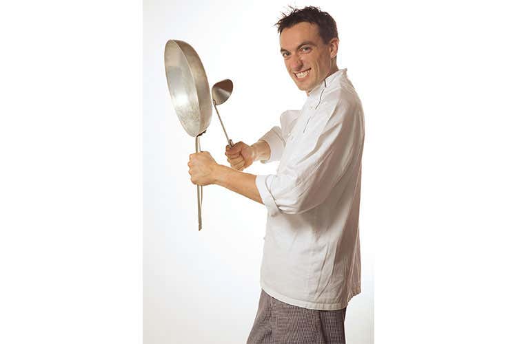 Quattro ospiti in cucina con la pizza di Paolo Pannacci al ristorante Lo Stela