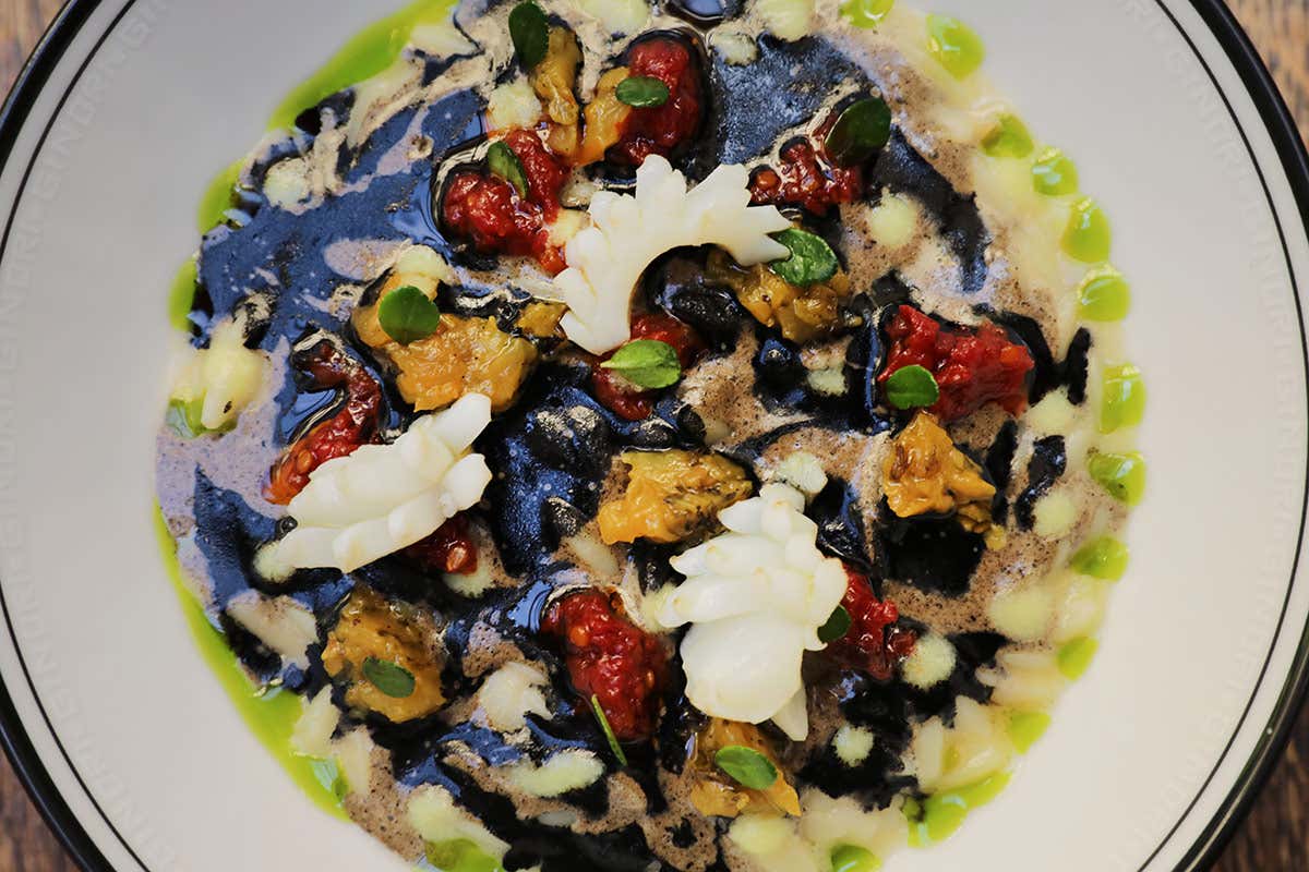 Risoni, fegato di seppia e pomodori confit Risoni, fegato di seppia e pomodori confit