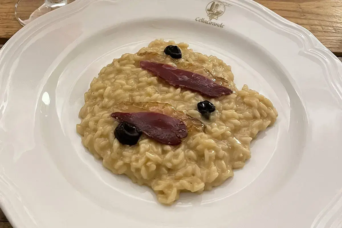 Risotto allo speck d&rsquo;anatra con aglio nero fermentato Risotto allo speck d&rsquo;anatra con aglio nero fermentato