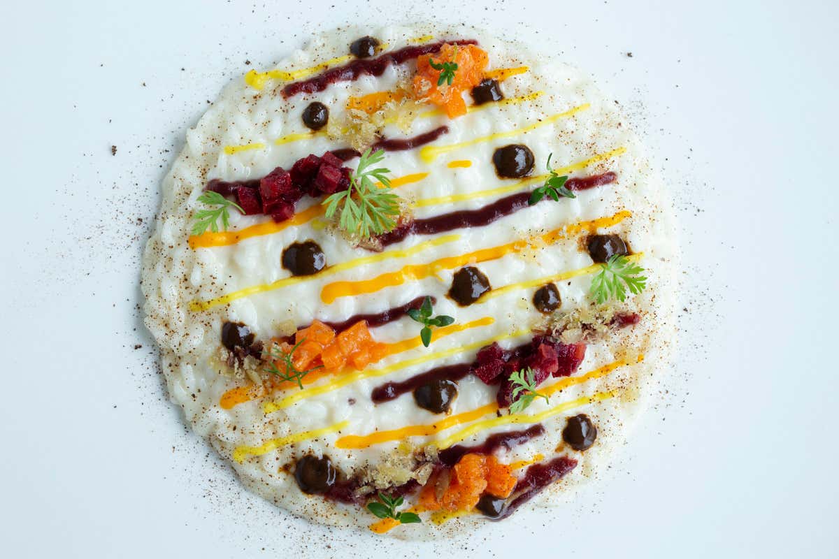 Risotto Riserva San Massimo mantecato con bufala affumicata Invito a cena con... stupore, al ristorante gourmet Corbezzoli Risotto Riserva San Massimo mantecato con bufala affumicata Invito a cena con... stupore, al ristorante gourmet Corbezzoli