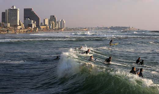 surfers line up, Tel Aviv beach front