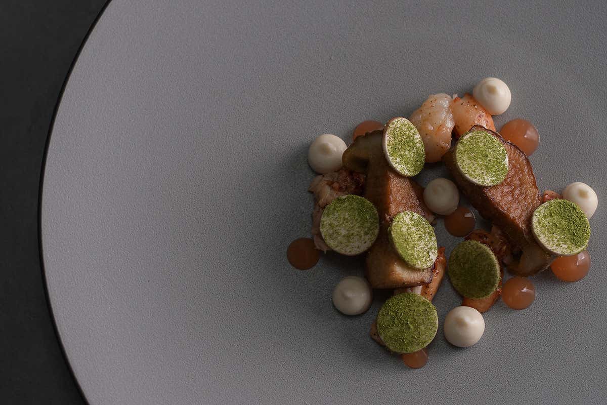 Astice confit, funghi porcini, rafano e pompelmo Bolle Restaurant, il timbro di Pentole Agnelli sulla ristorazione bergamasca