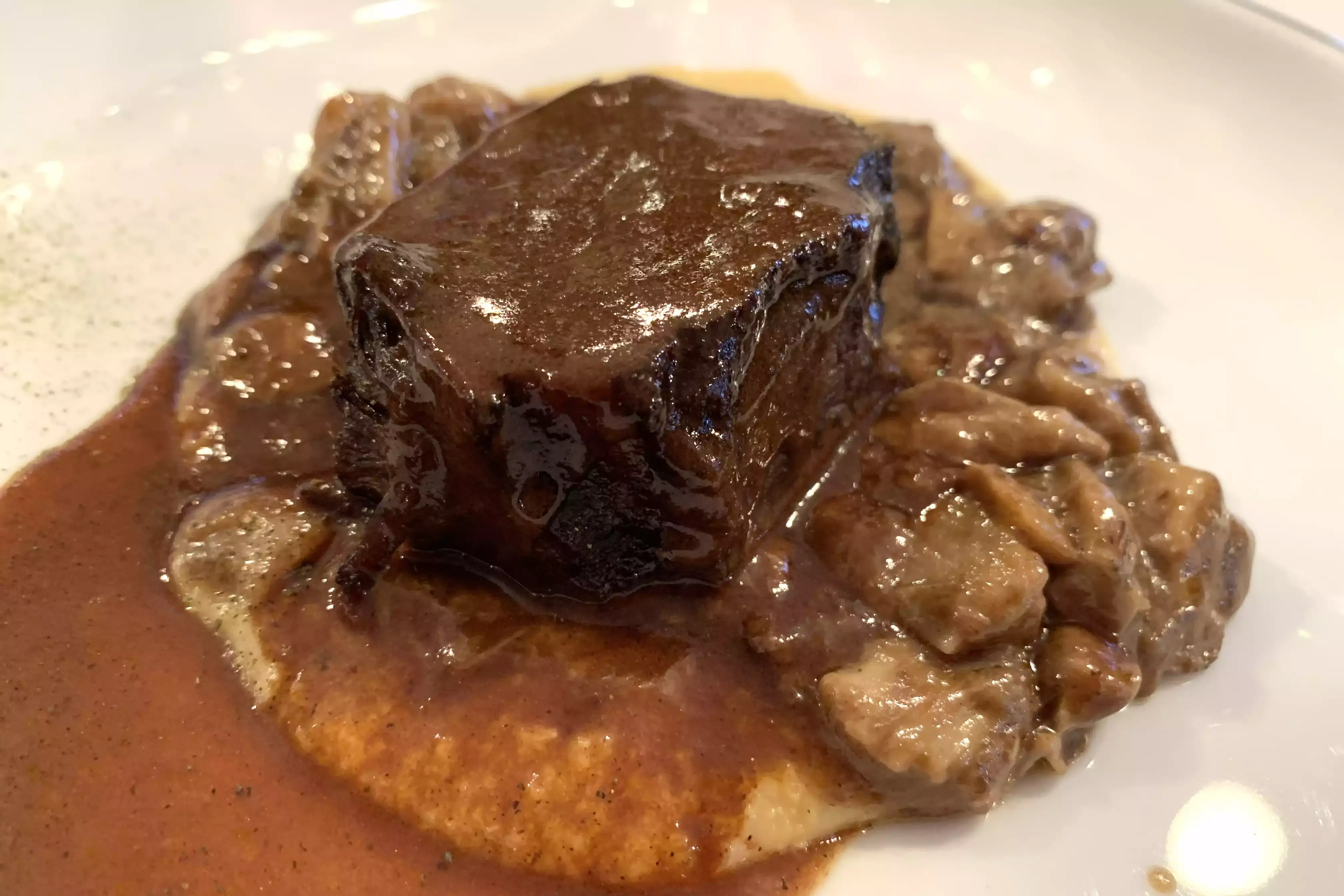 Polenta, guancia brasata al Cargnano del Sulcis e porcini di Giancarlo Morelli Dieci anni di Ristogolf: si festeggia a tavola