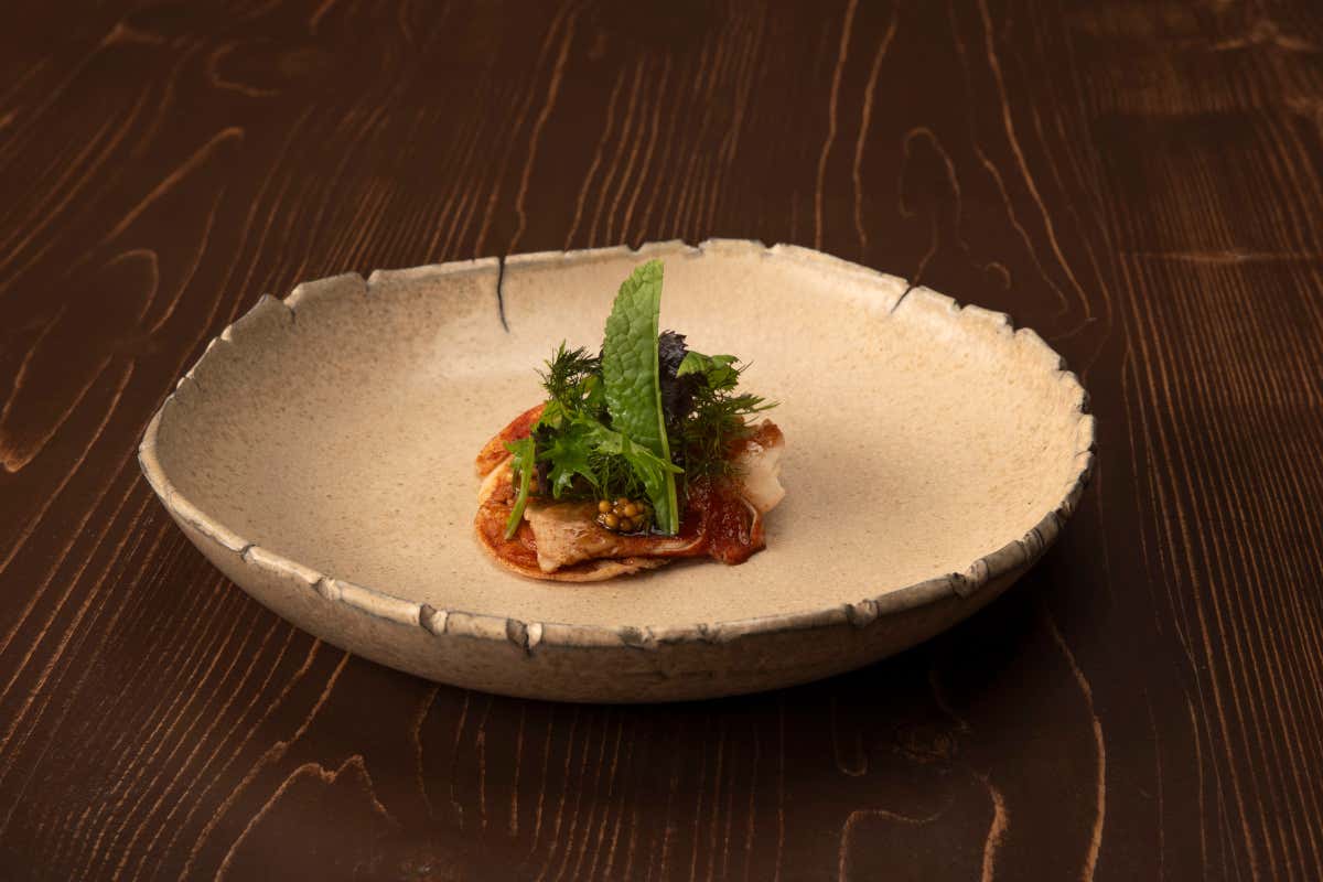 Andrea De Lillo, il Garda che brilla di stella: il Nin racconta il lago con gusto e sostenibilità Andrea De Lillo, il Garda che brilla di stella: il Nin racconta il lago con gusto e sostenibilità