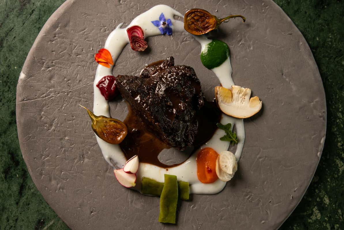 Una creazione dello chef Cooperativa de' pazzi: il cibo favorisce l'inclusione sociale