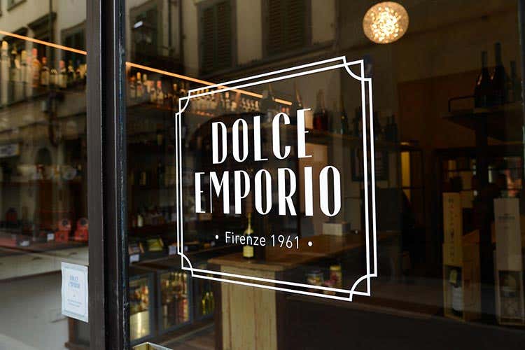 L'insegna di Dolce Emporio - A Dolce Emporio le cene gourmet si ordinano anche da portare a casa