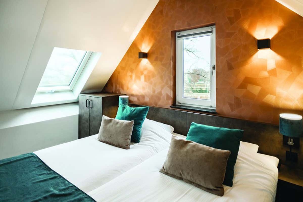 Camere d’hotel luminose anche agli ultimi piani? Con le finestre da tetto si può Camere d’hotel luminose anche agli ultimi piani? Con le finestre da tetto si può