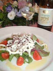 Insalatina tiepida di calamari alla vinaigrette di olive nere