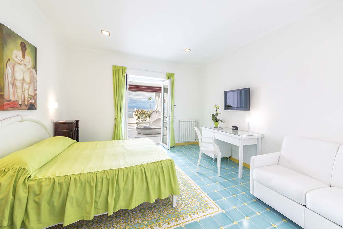 Una delle camere In vacanza a Ischia in una baia privata a La Madonnina Boutique Hotel