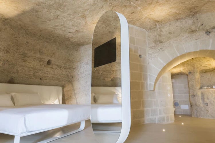 Una stanza dell'Aquatio Cave Luxury Hotel & SPA a Matera Location originali per una notte da non dimenticare