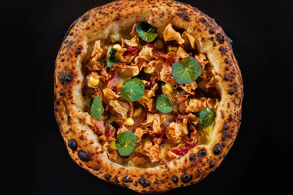 Da Dazio la protagonista è naturalmente la pizza Tonda, buona e… moderna ecco come è la pizza di Dazio a Roma Da Dazio la protagonista è naturalmente la pizza Tonda, buona e… moderna ecco come è la pizza di Dazio a Roma