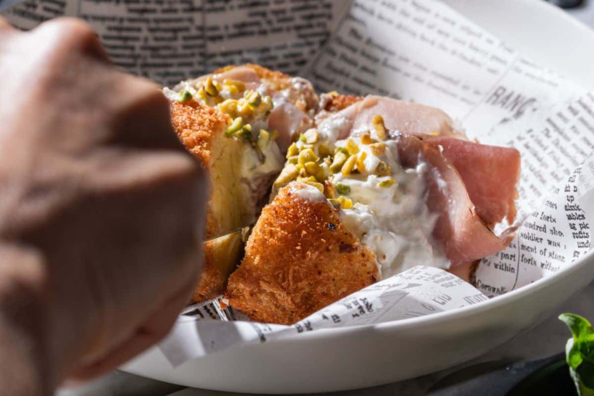 Primo San Lorenzo: smashburger, pizza e birre in stile industrial londinese 