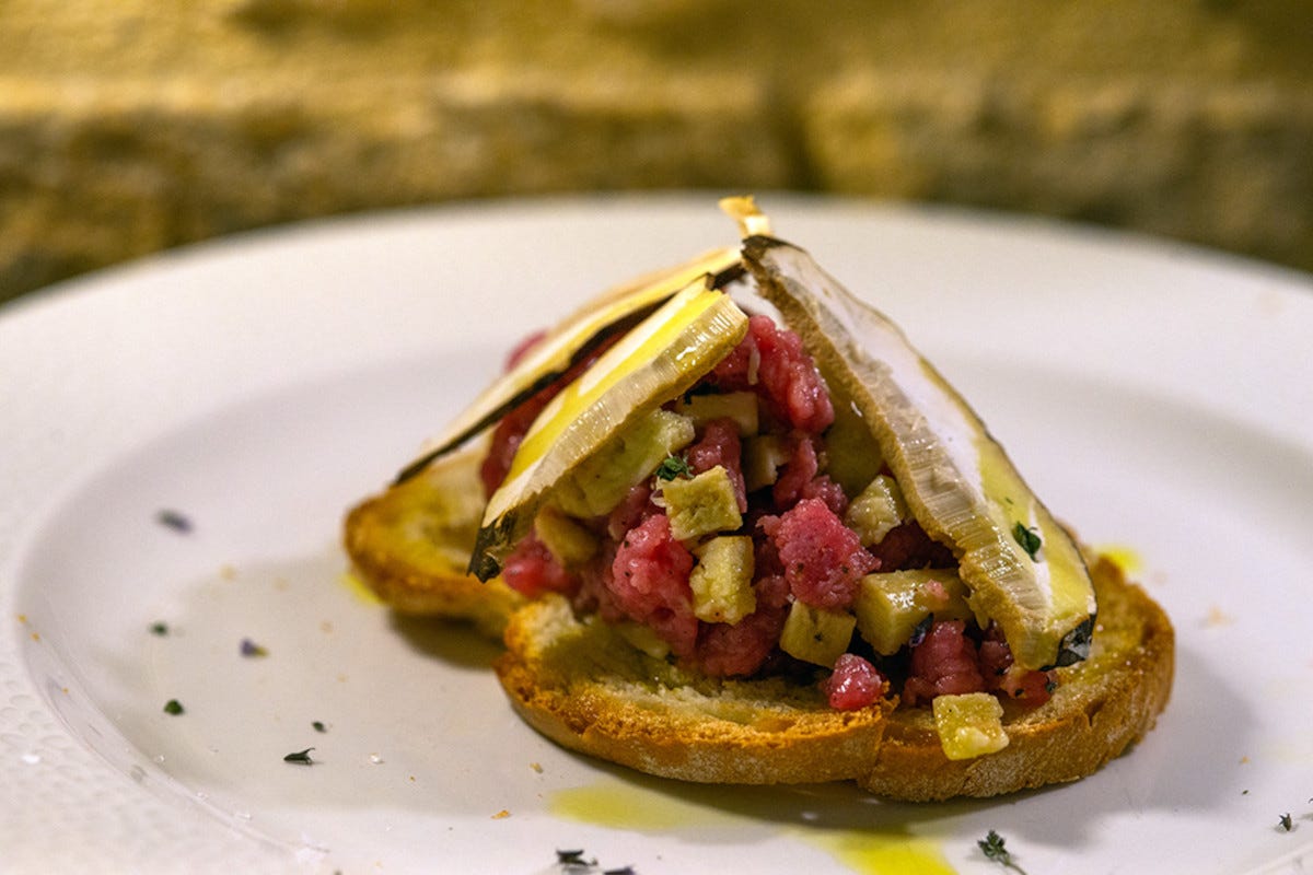Una varietà di bruschetta de La Vecchia Nicchia San Gimignano e il Prosciutto Toscano Dop: binomio di bellezza e qualità