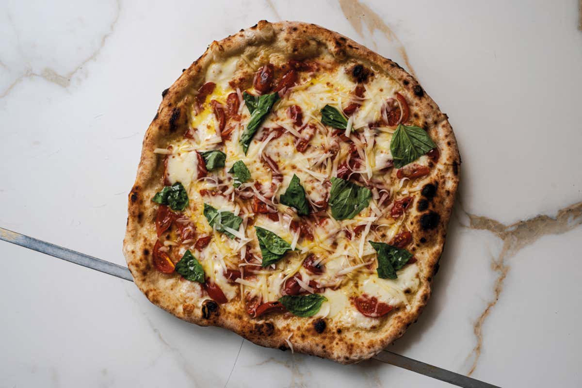 Il futuro della pizza è high-tech, ma per i pizzaioli servono gli strumenti giusti Il futuro della pizza è high-tech, ma per i pizzaioli servono gli strumenti giusti