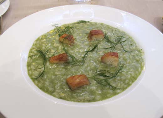 Risotto mantecato alle erbe, anguilla affumicata e limone