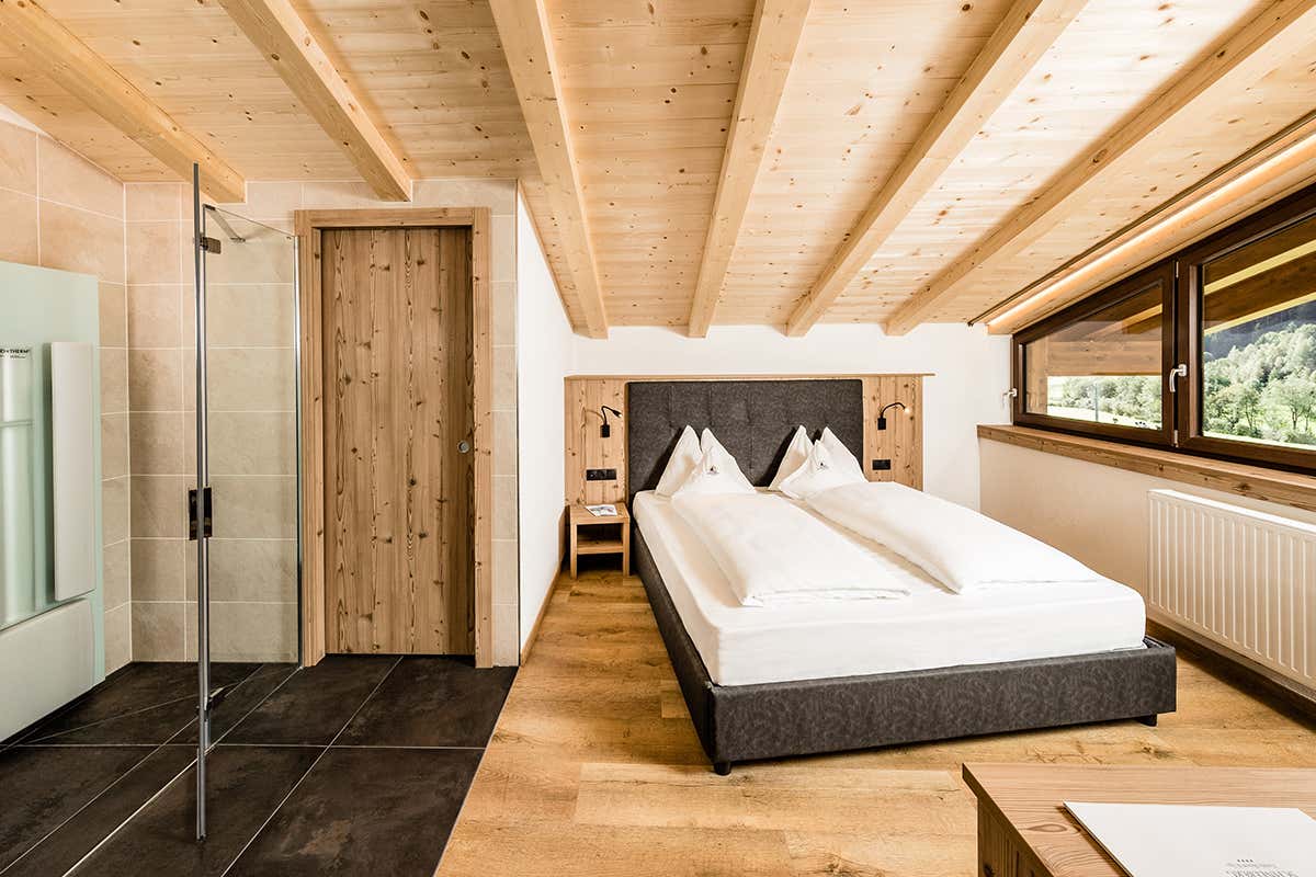 Una delle camere L’hotel per famiglie che coccola i genitori: nuova ala adults only allo Schneeberg