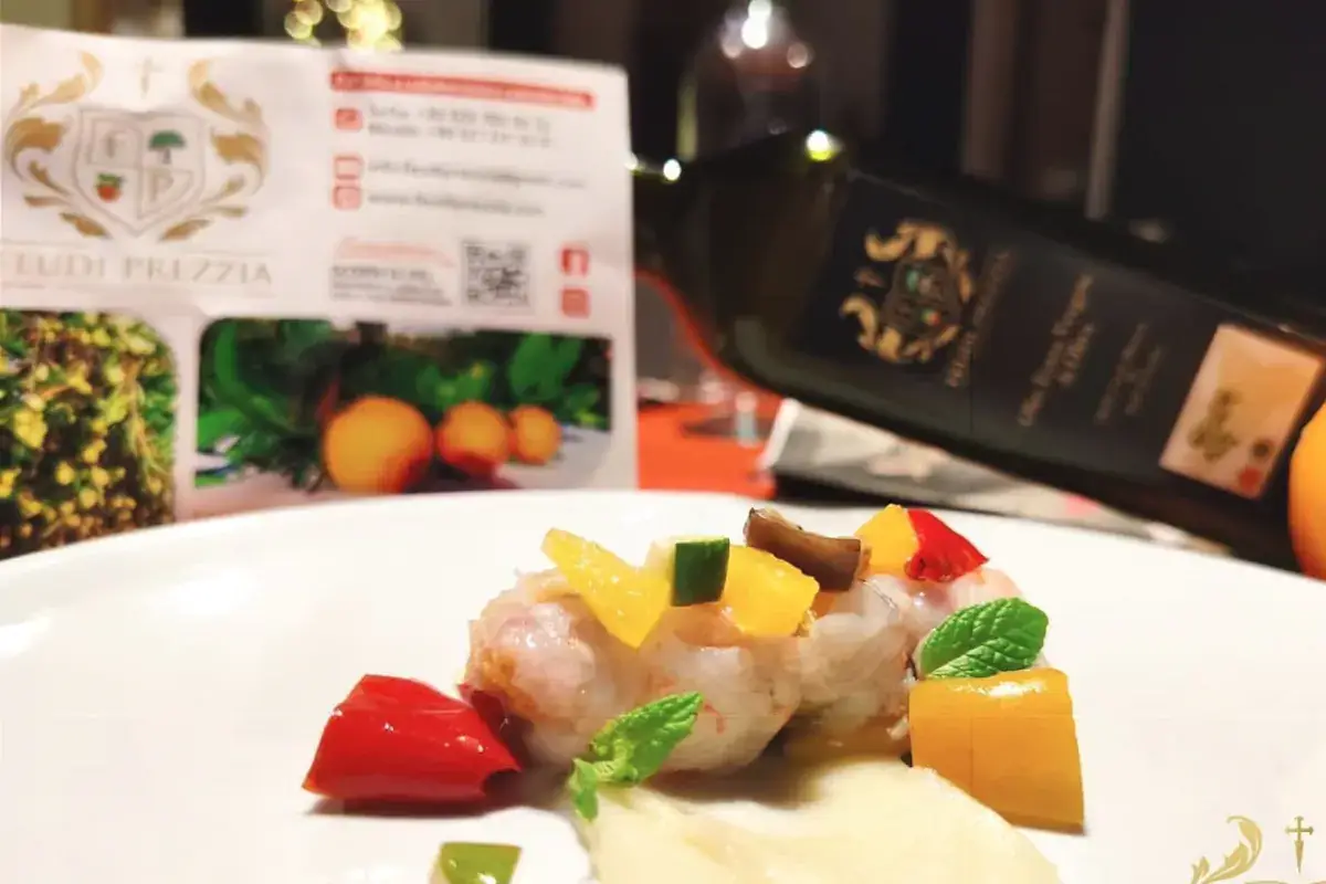 Crudité di gambero su salsa Parmantier all'Arancia di Ribera con ortaggi saltati L'Arancia di Ribera Dop incontra l'arte culinaria di Enzo Contini grazie a Feudi Prezzia