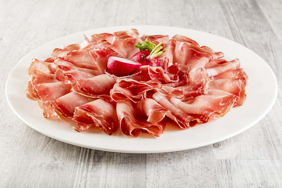 Lo Speck Alto Adige Igp è un alimento dalla grande versatilità in cucina Speck Alto Adige Igp: il Consorzio festeggia 30 anni di tutela