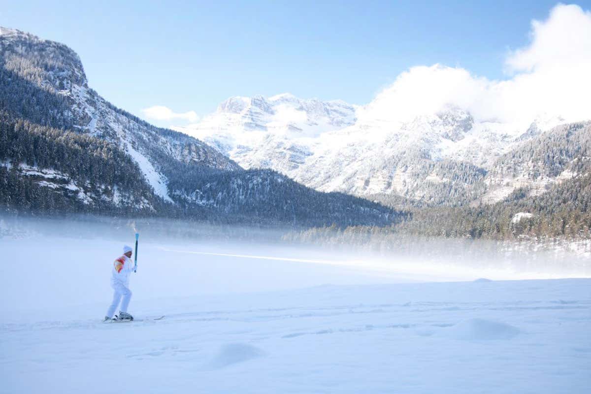 La fiamma olimpica sulle nevi