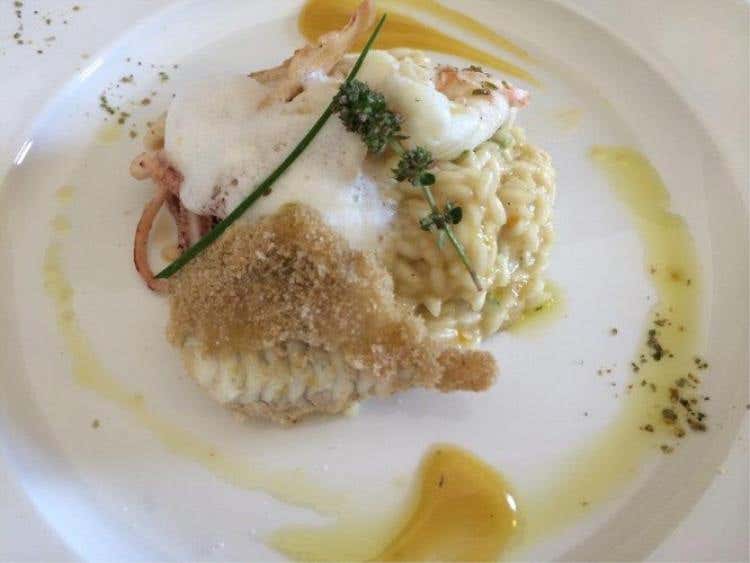 Risotto “tutto diverso”, cotture di Rombo e calamari all’arancia e pepe verde, di Guglielmo Arnulfo