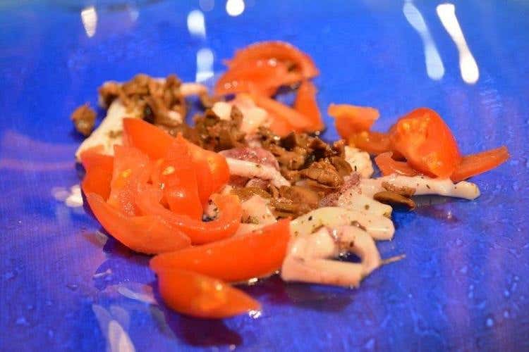 Calamari con capperi, olive, pomodorini e origano - Alfonso Caputo