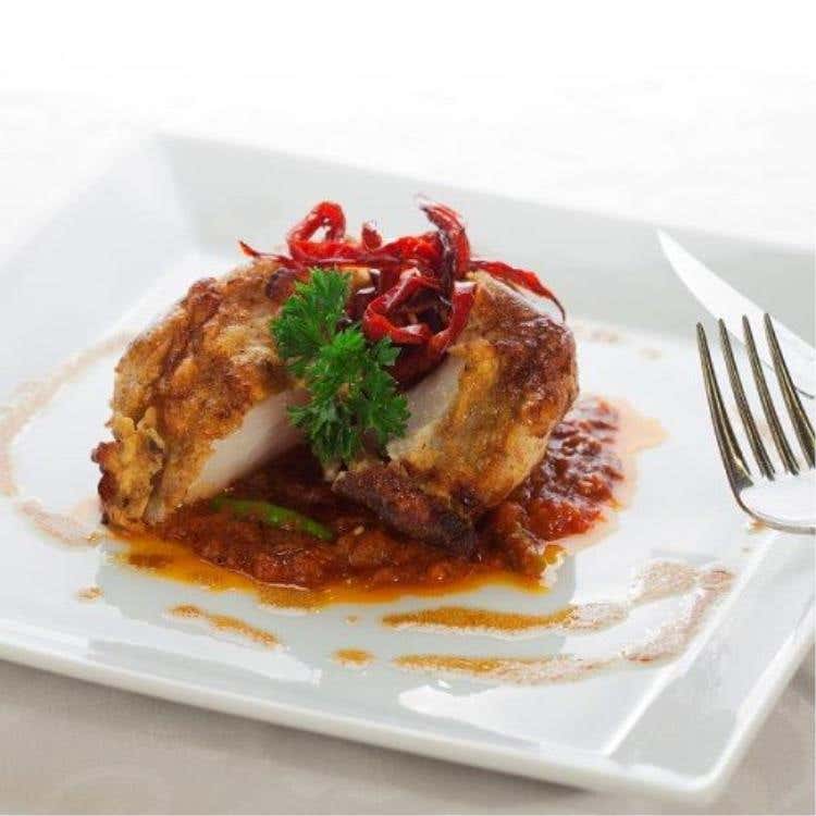 Maratha Macchli: Rana pescatrice in salsa di spezie tostate, tipiche del Maharashtra