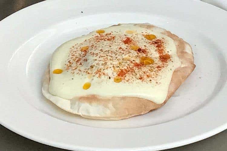 Merluzzo all’affumicatura di pigna con condimento alla pizzaiola di Pino Cuttaia - La Madia (Cucina, vino e servizio in abbinamento Un percorso di gusto a Milano