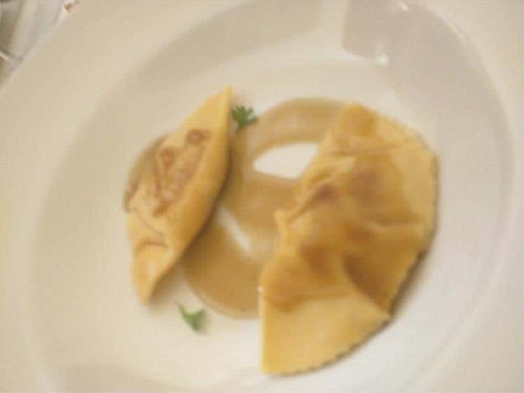 Pizzicotto agli scampi, infusione di caffè e limone candito