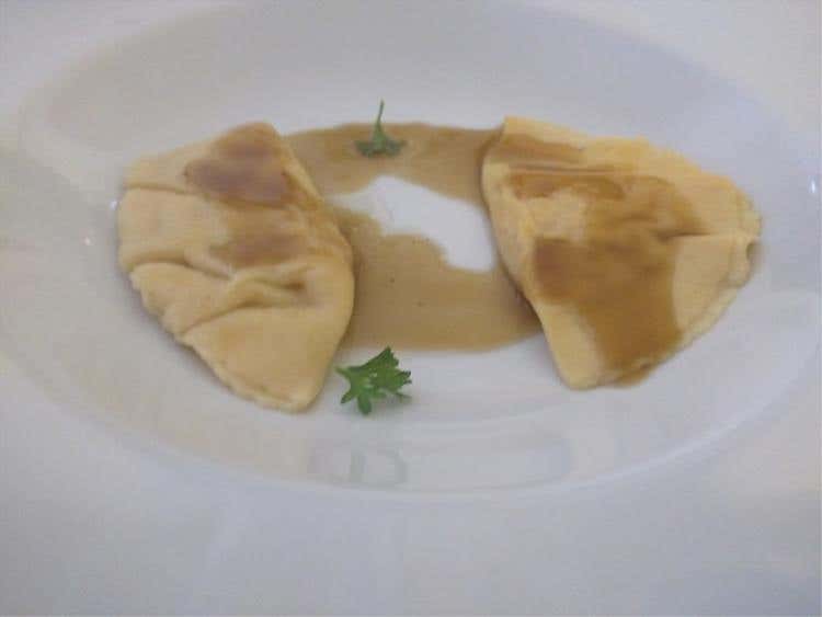 Pizzicotto agli scampi, infusione di caffè e limone candito