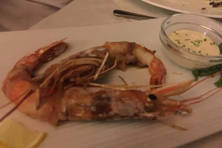 Luci del tramonto e cucina dal tocco sardo 
Pedramare incanta per gusto e panorama