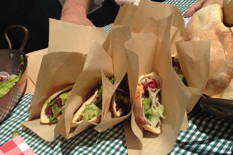 Panino con porchetta - Pic-nic gourmet tra le Dolomiti 
Ai fornelli 11 cuochi d’eccezione